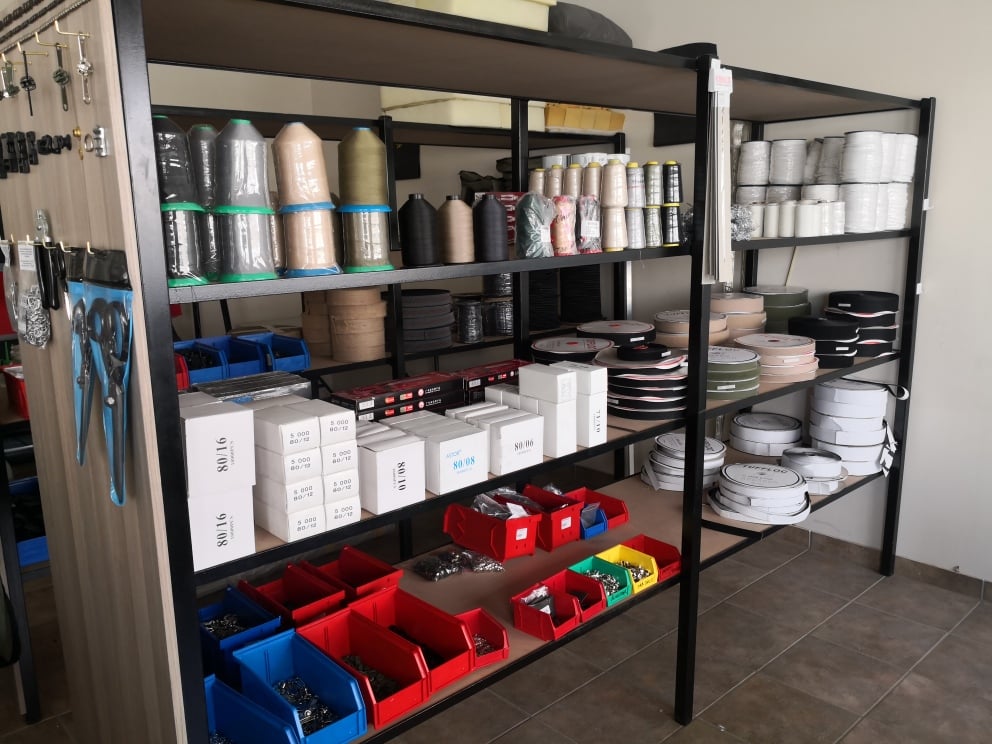 Shelves with canvas, foam, and supplies